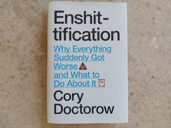 A book, seen against a concrete floor. The book is Enshittificantion by Cory Doctorow. The subtitle is "Why Everything Suddenly Got Worse and What to Do About It"